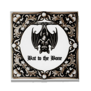 Dutch tile in black with a bat hanging upside down giving the finger with the test bat to the bone under it