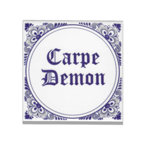 Dutch ceramic tile in delftsblauw with the text Carpe Demon on it