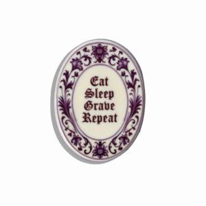 Dutch ceramic tile with the text Eat, Sleep, grave Repeat on it in delftsblauw