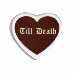 Heart shaped ceramic tile with a brown heart on it and the text till death in white