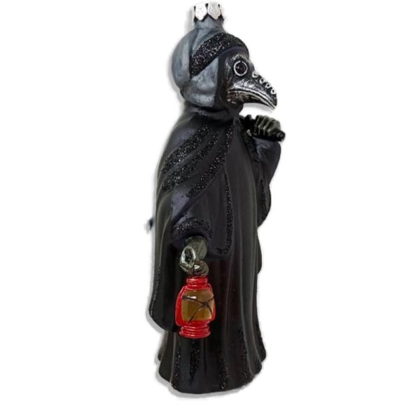 side of a glass christmas ornament plague doctor