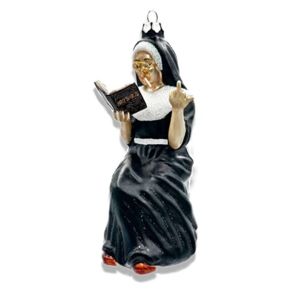 Glass Christmas Ornament of a smoking nun that flips the bird.