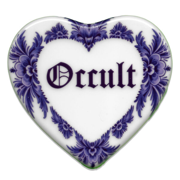 Ceramic heart shaped tile in blue saying occult