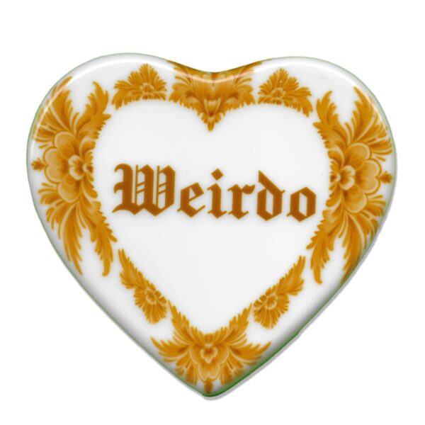 Heart shaped ceramic tile saying weirdo