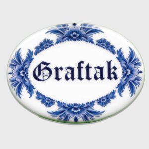 Blue oval shaped ceramic tile saying graftak